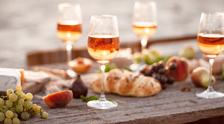Image for Why Everyone’s Obsessed with Orange Wine — And What to Pair It With This Summer